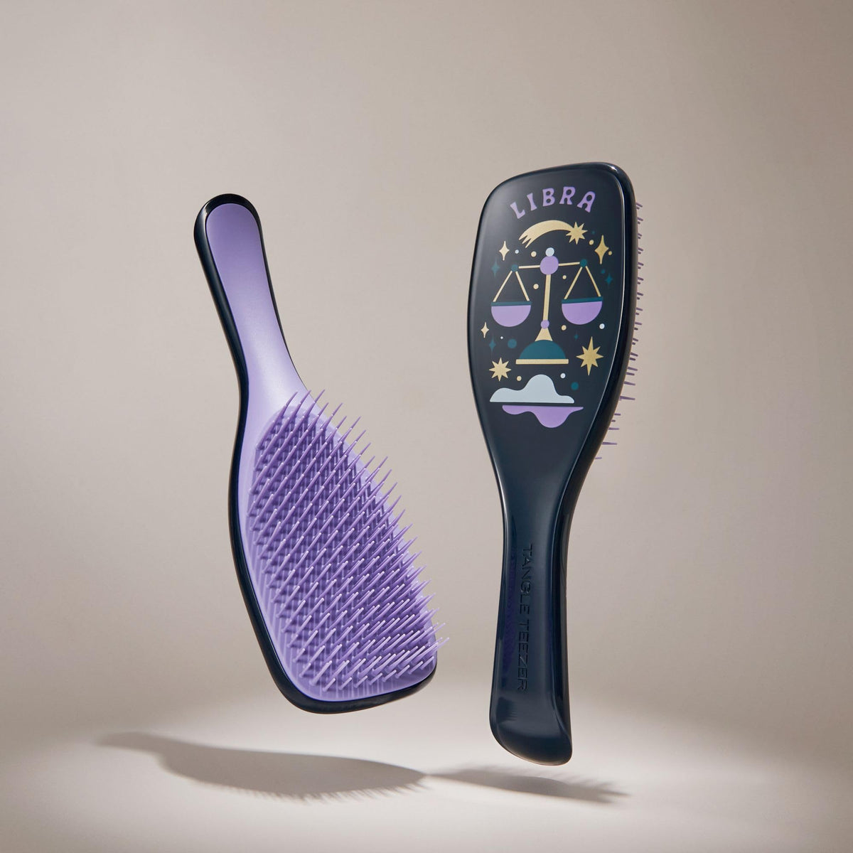 Tangle Teezer Libra brush used on wet hair to apply treatments.