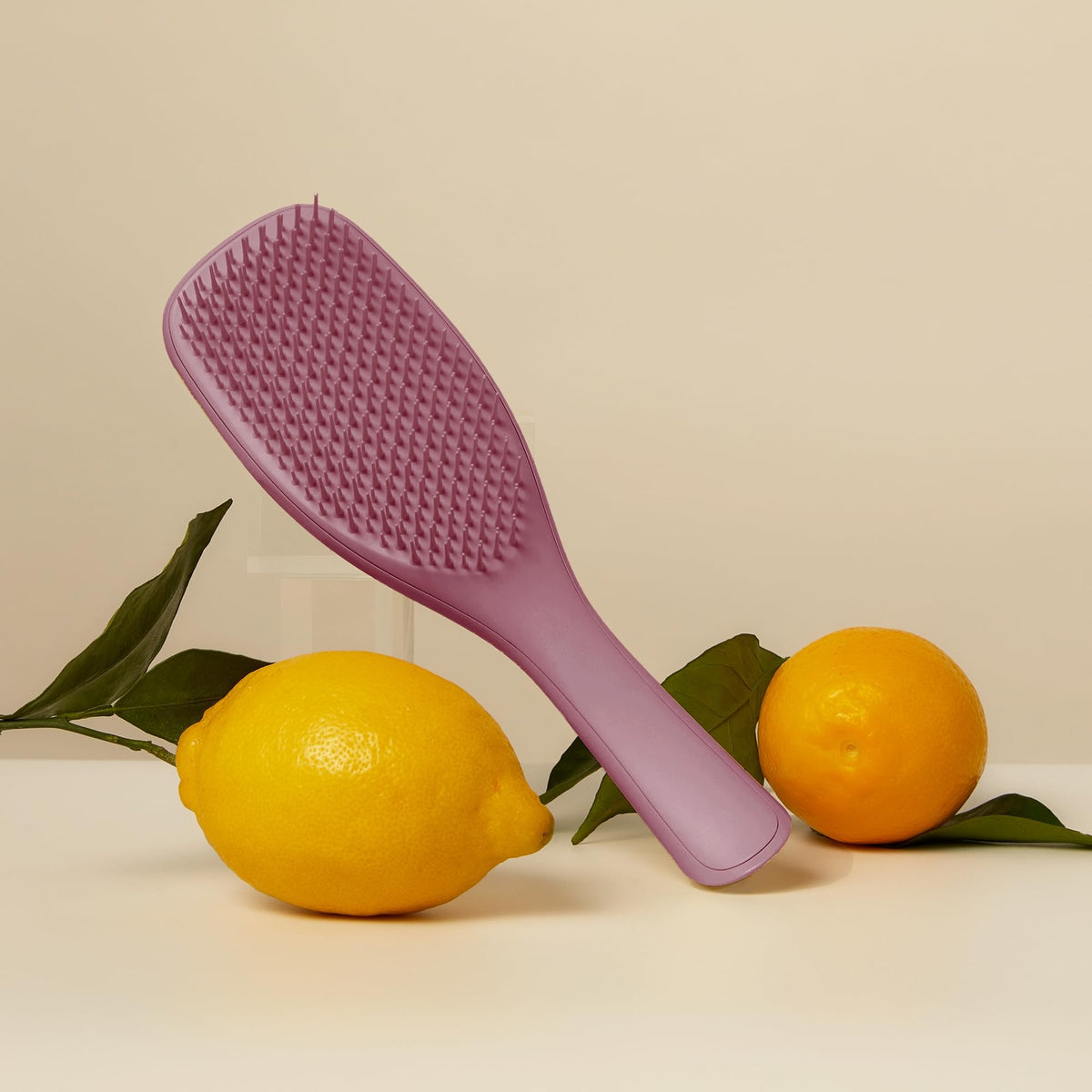 Tangle Teezer plant-based castor beans for sustainable hair care.