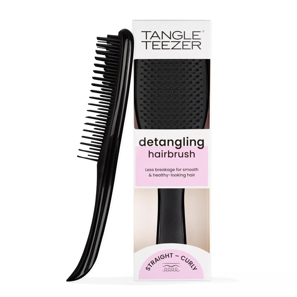 Tangle Teezer Wet Detangler Liquorice Black close-up showing smooth glide for knot-free detangling.