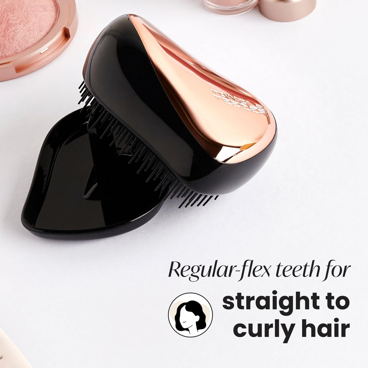 Tangle Teezer Compact Styler shown on wet hair for effective detangling