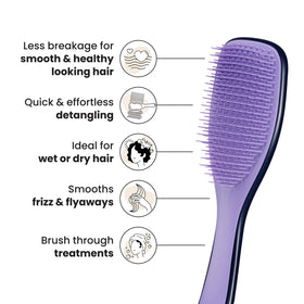 Tangle Teezer zodiac artwork on handle adds personality while distributing conditioner.