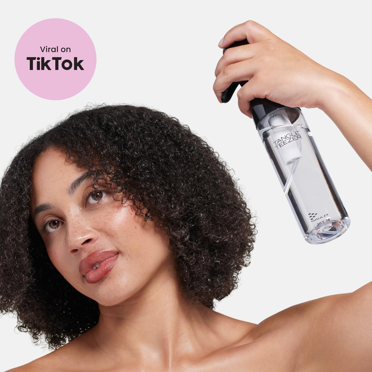 Tangle Teezer Fine Mist Bottle close-up of continuous spray mechanism