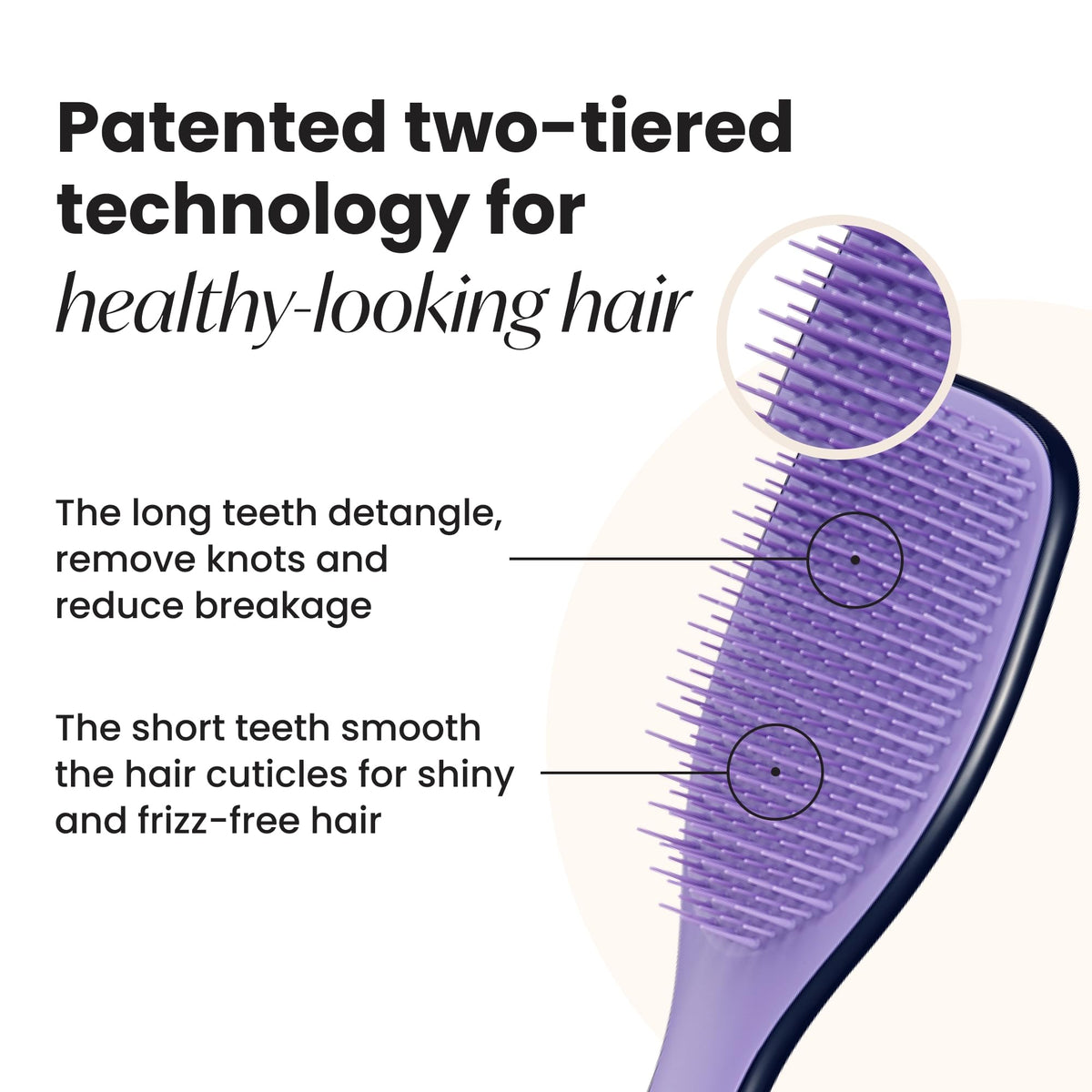 Tangle Teezer Zodiac Ultimate Detangler two-tier teeth close-up smoothing strands.