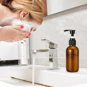 Tanlade glass bottles displayed on bathroom shelf for stylish storage