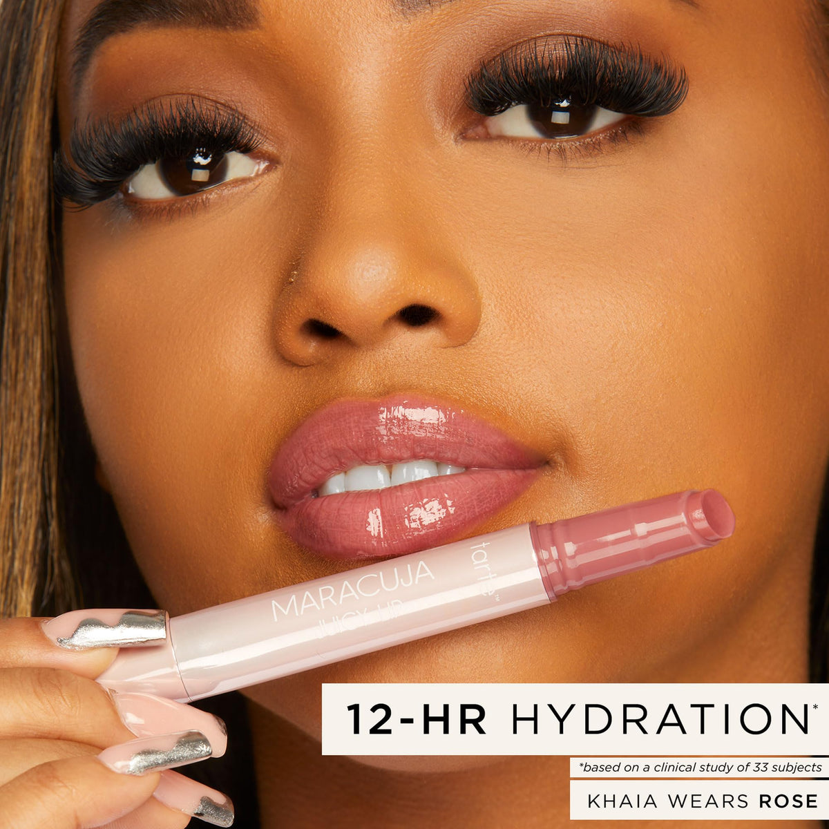 tarte maracuja juicy lip balm gloss mirror-shine lips for a vibrant glossy look.