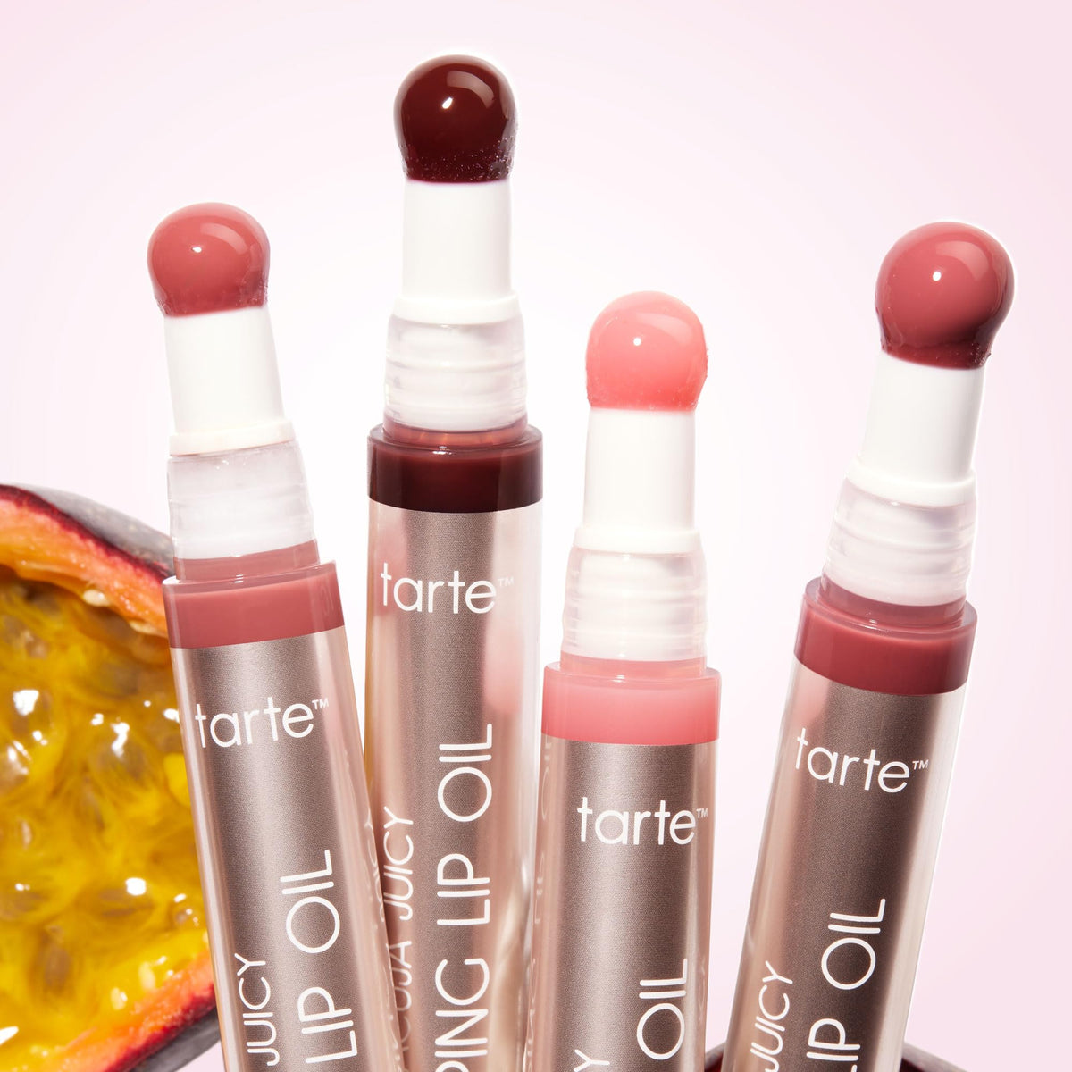 Tarte Maracuja Juicy Lip Oil packaging close-up highlights luxe wand.