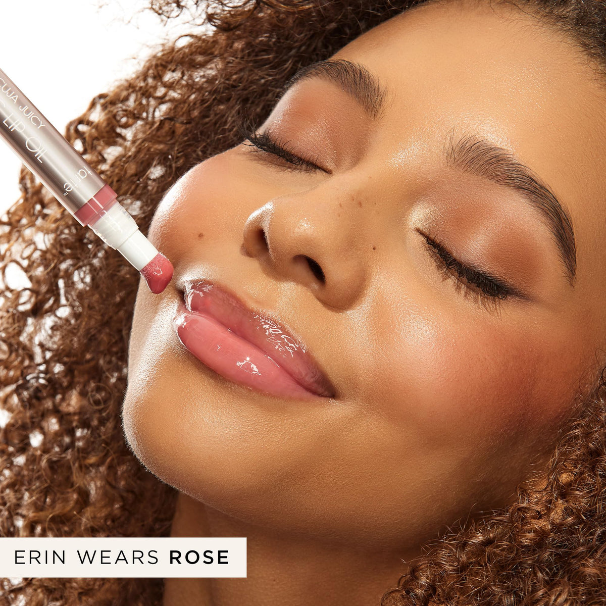 Tarte Maracuja Juicy Lip Oil swirl highlights nourishing oils and shine.