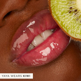 tarte maracuja juicy lip shift swirl texture demonstrates a smooth glide and pink-tinged shade.