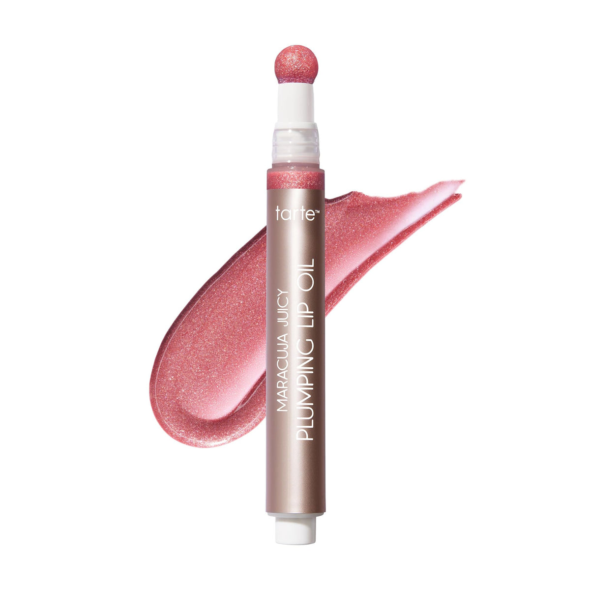 Tarte Maracuja Juicy Plumping Lip Oil applies with a glossy, hydrating finish on the lips.