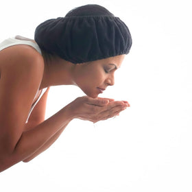 TASSI reusable spa headband wrap for face cleansing keeps hair away during skincare.
