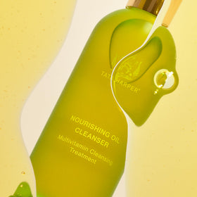 Tata Harper Nourishing Oil Cleanser packaging closeup emphasizes premium branding.