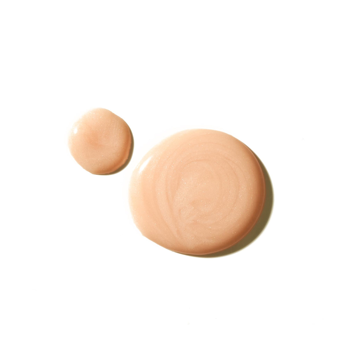 Texture close-up of Tata Harper Resurfacing Serum showing gentle exfoliation
