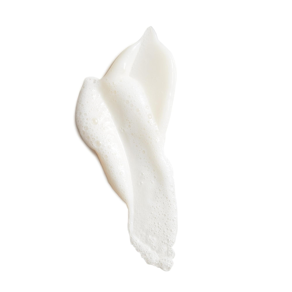 Tata Harper Superkind Softening Cleanser foam close-up shows micro-foam texture.