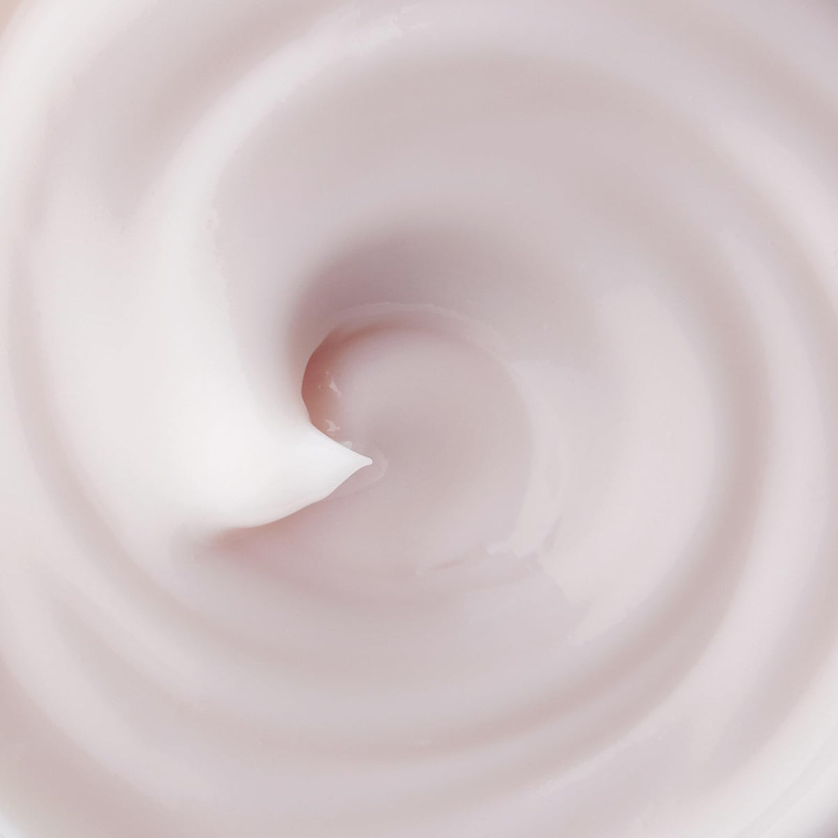 TATCHA Ageless Enriching Renewal Cream applied to hands to hydrate very dry skin.
