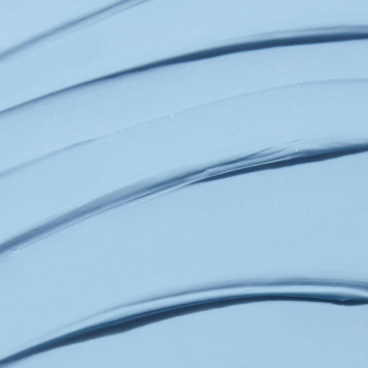 TATCHA Indigo Calming Cream texture swirl demonstrates silky hydration for calm skin.