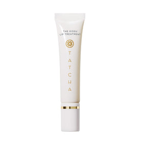 TATCHA Kissu Lip Treatment bottle close-up for instant plump hydration.