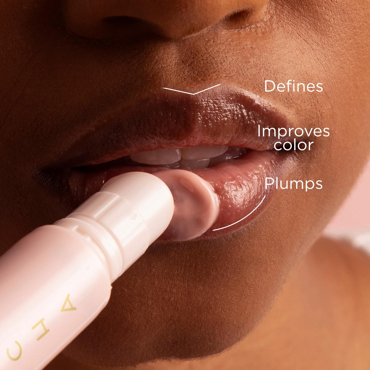 TATCHA Kissu Lip Treatment swatch illustrates color revival and moisture.