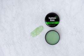 Tattoo Goo demonstrating color vibrancy protection for long-lasting ink.