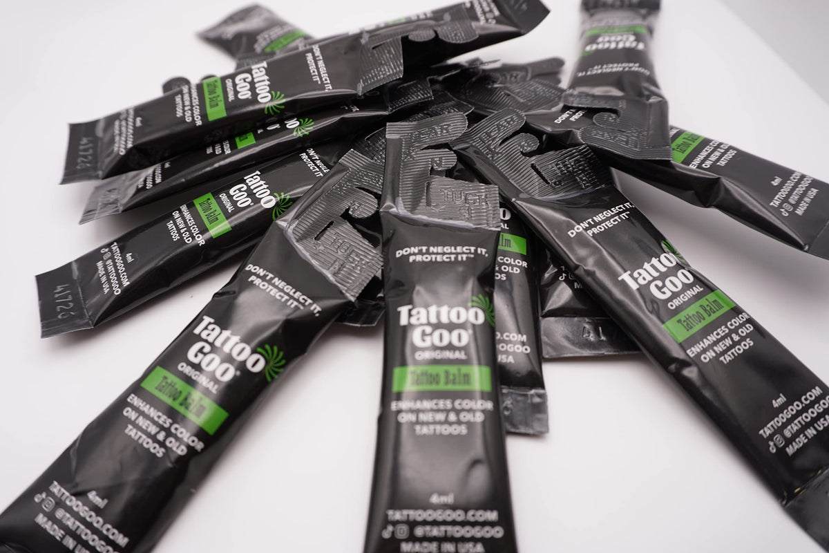 Tattoo Goo fast-absorbing balm in action for comfortable wear.