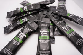 Tattoo Goo fast-absorbing balm in action for comfortable wear.