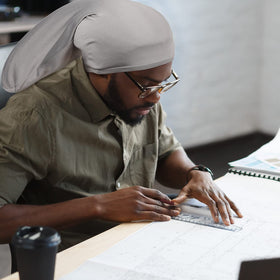 Tatuo dreadlock cap in use, sleeping scene, hair stays neat.