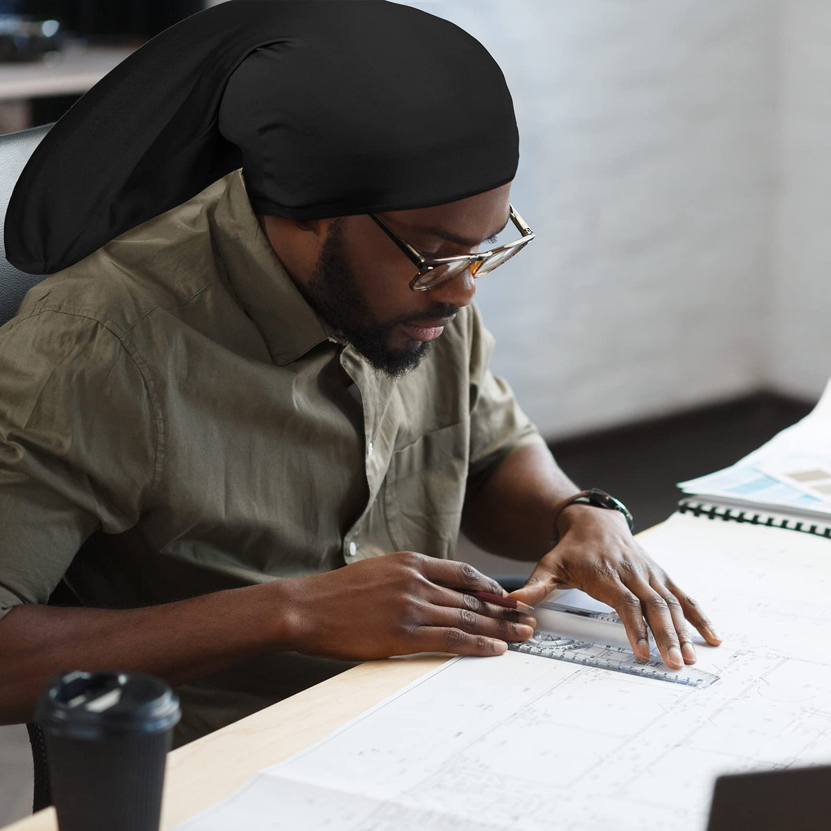 Tatuo cap worn during exercise, secure fit for active routines
