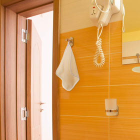 Tatuo exfoliating cloth in use during bath demonstrates hands-on exfoliation.