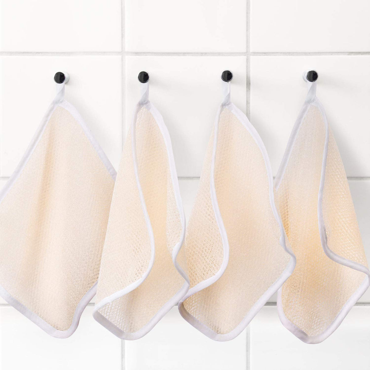 Tatuo exfoliating cloth size 27x23 cm shown on the product label.
