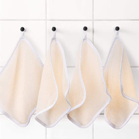 Tatuo exfoliating cloth size 27x23 cm shown on the product label.