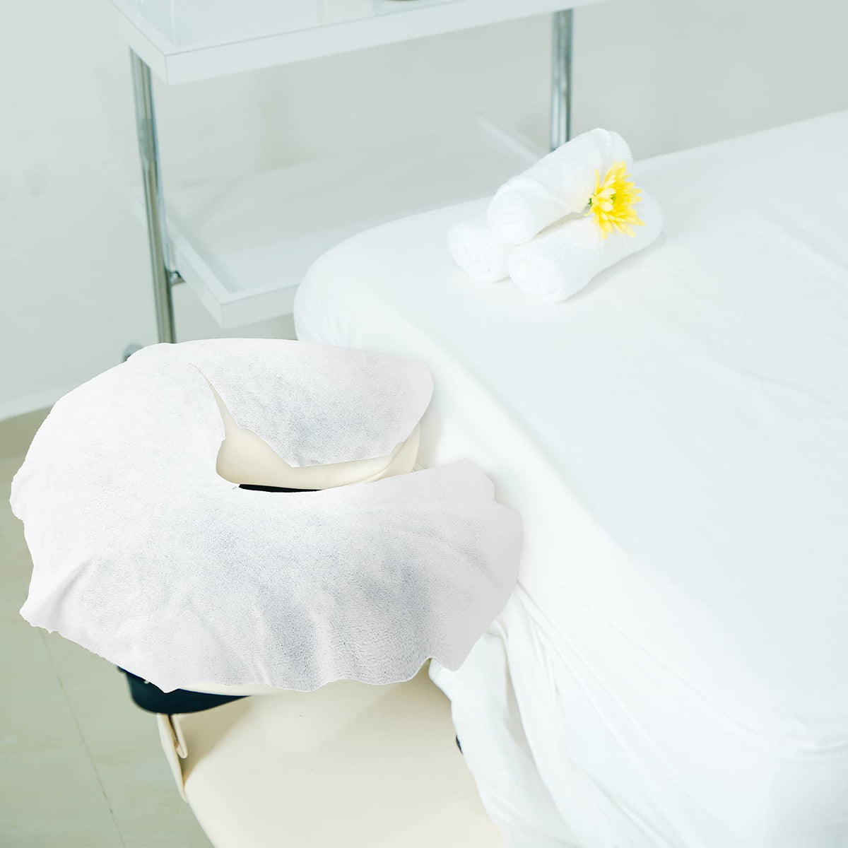 Tatuo headrest covers 12 x 15.5 inches shown on a massage table.