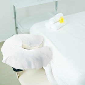 Tatuo headrest covers 12 x 15.5 inches shown on a massage table.