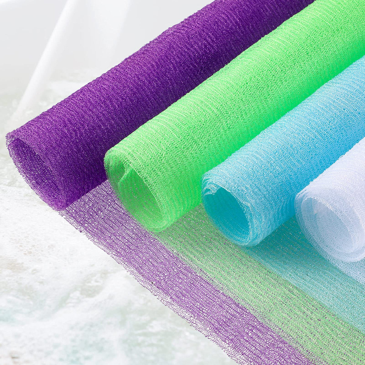 Tatuo washable exfoliating towel ready for machine washing and reuse.