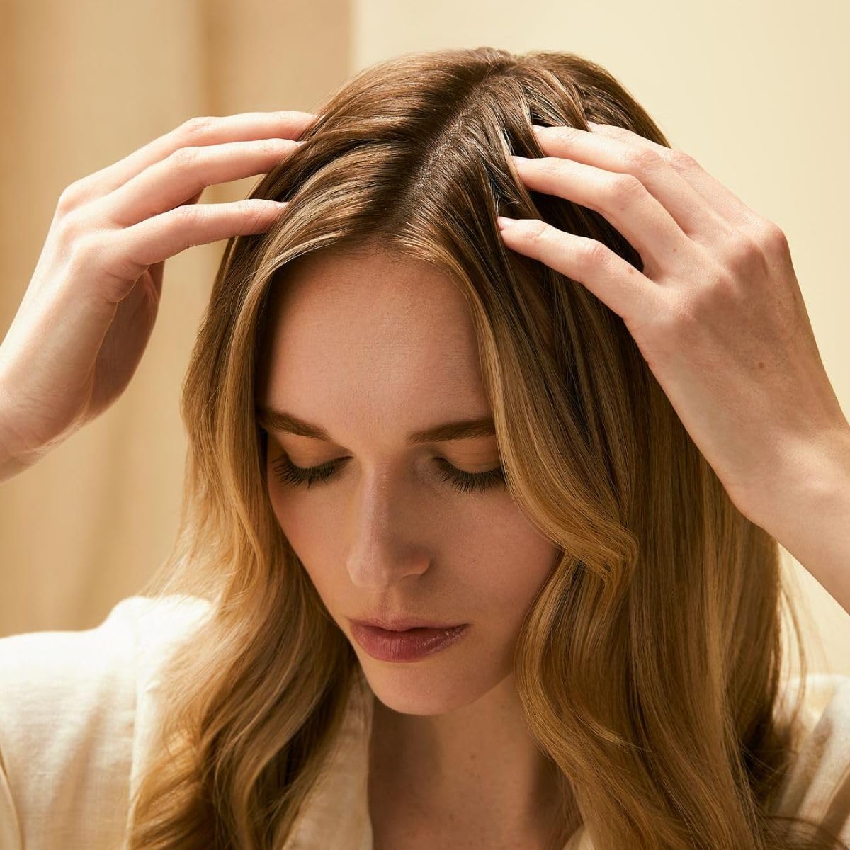 Tea Tree Scalp Wellness Serum absorbed into the scalp with no residue.
