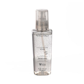 Tec Italy Silk System Shine Serum bottle closeup showing enhanced shine for all hair types.