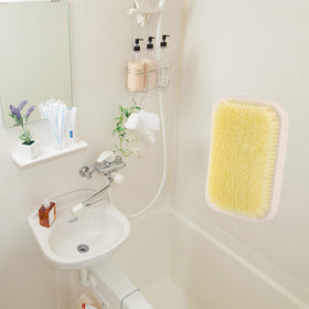 Tecbeauty hands-free back scrub brush helps reach the back while washing.
