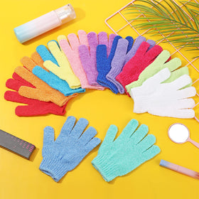 Tegeme spa-at-home exfoliation with shower gloves and soap.