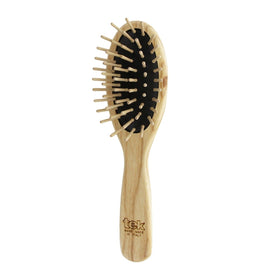 TEK oval wooden brush in natural ash for smooth detangling and scalp care.
