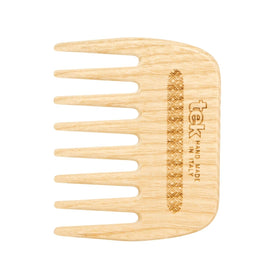 TEK wooden comb with long rounded teeth for gentle detangling in natural ash wood.