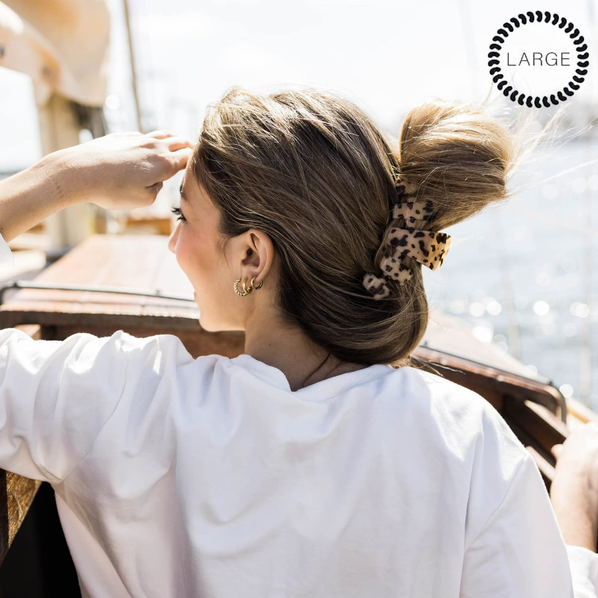 Teleties large clip provides reliable hold across hair textures.