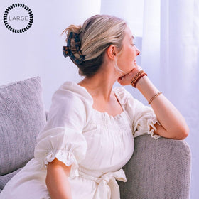 Teleties strong grip clip demonstrates durable hold for heavy or textured hair.