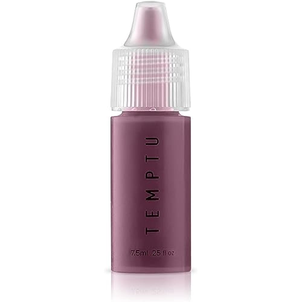 TEMPTU S/B Adjuster Violet bottle pour for precise shade customization.