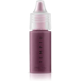 TEMPTU S/B Adjuster Violet bottle pour for precise shade customization.