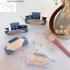 Tethzeng hair claws 4.1-inch in white and dusty blue for secure styling