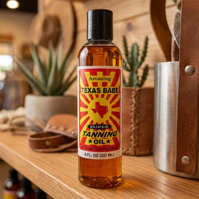 Texas Babe Tanning Oil Original bottle prepares skin for sun exposure with a lightweight feel.