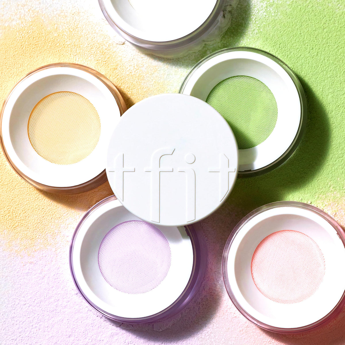 TFIT Translucent Set Finishing Powder jar close-up highlighting soft-focus texture for pores.