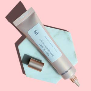 Thank You Farmer Sun Project Shimmer Sun Essence pink pearl shimmer on skin.