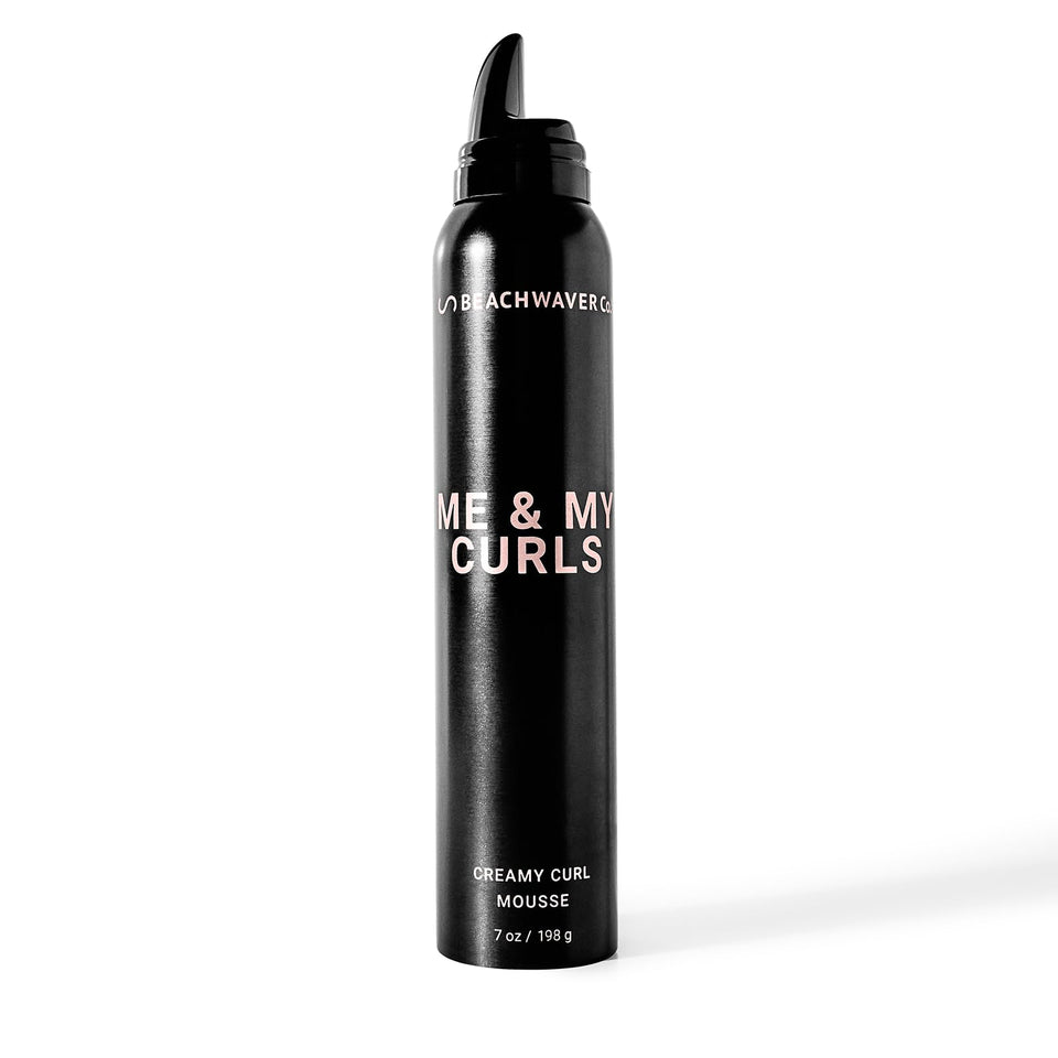 The Beachwaver Co. Me & My Curls Creamy Curl Mousse bottle highlights a lightweight, defining formula.