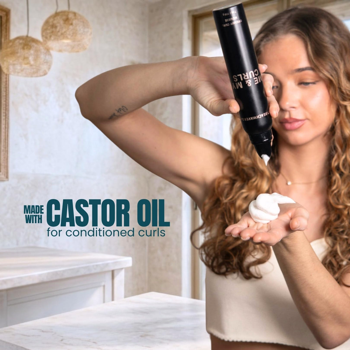Close-up of the creamy texture delivering soft hold for waves and curls.