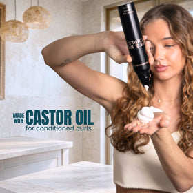 Close-up of the creamy texture delivering soft hold for waves and curls.