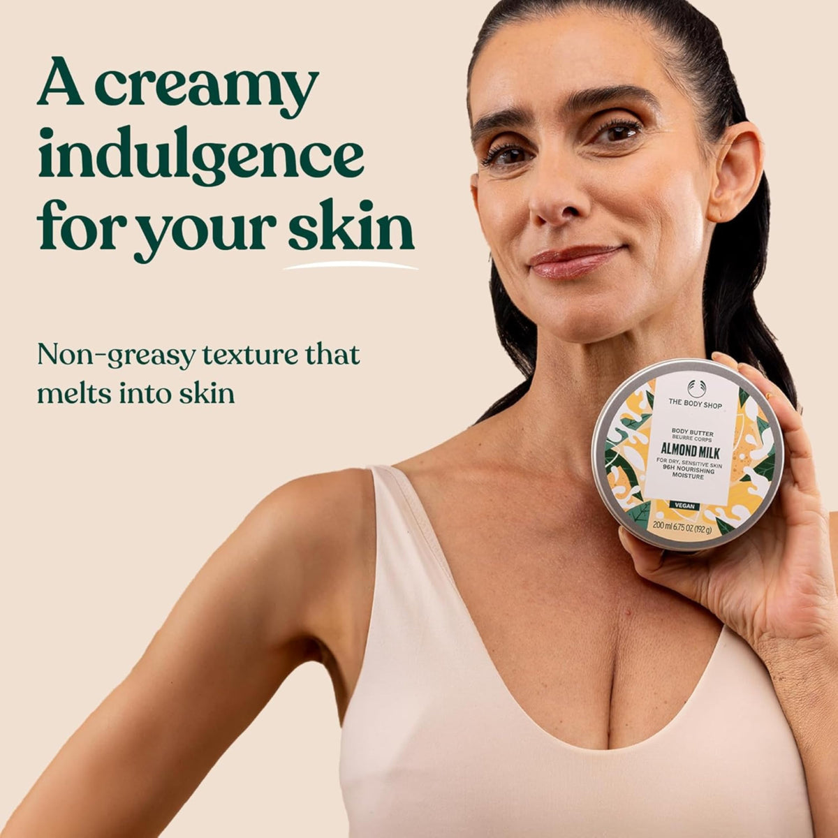 The Body Shop Almond Milk Body Butter packaging front view.